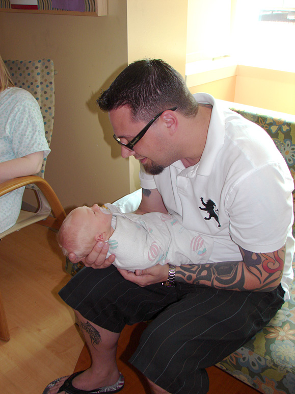 Ryan with his newborn, Marshall Anthony (176.82 KB)