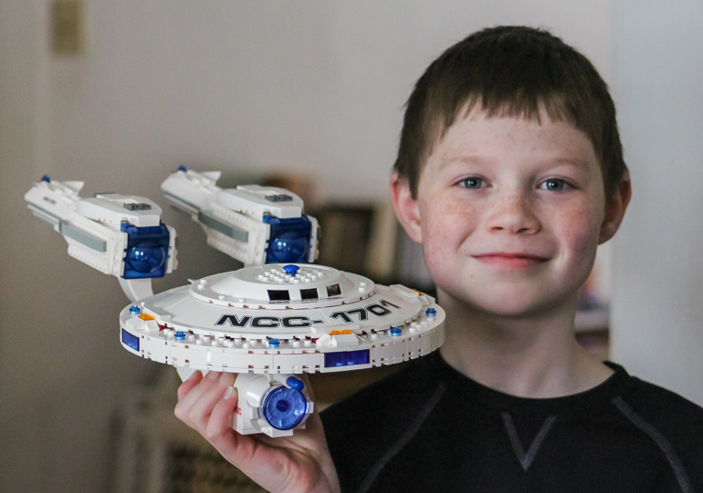 Andrew, showing off his completed Enterprise Lego set (166.86 KB)