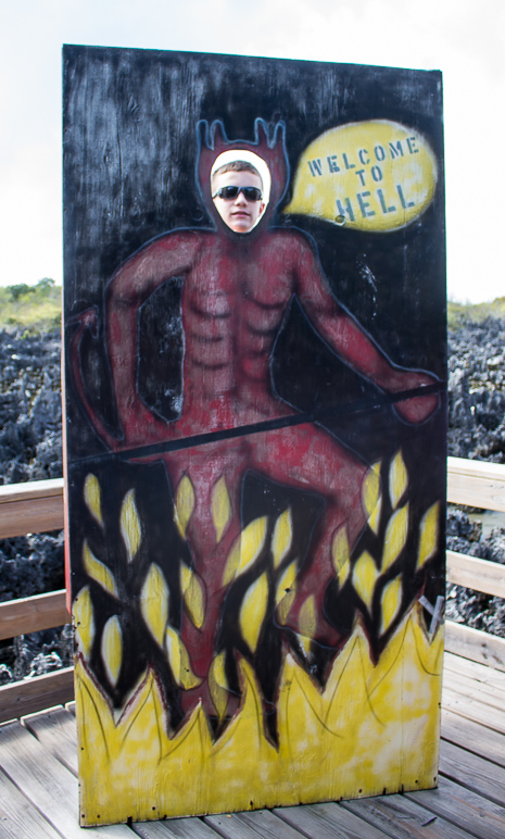 We had to be true tourists.  Jake welcoming you to Hell. (221.55 KB)