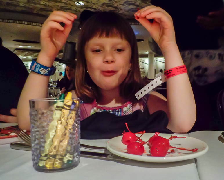 Katelyn enjoyed the cherries in her cherry Coke so much that our drink server started bringing her little plates of cherries. (213.08 KB)