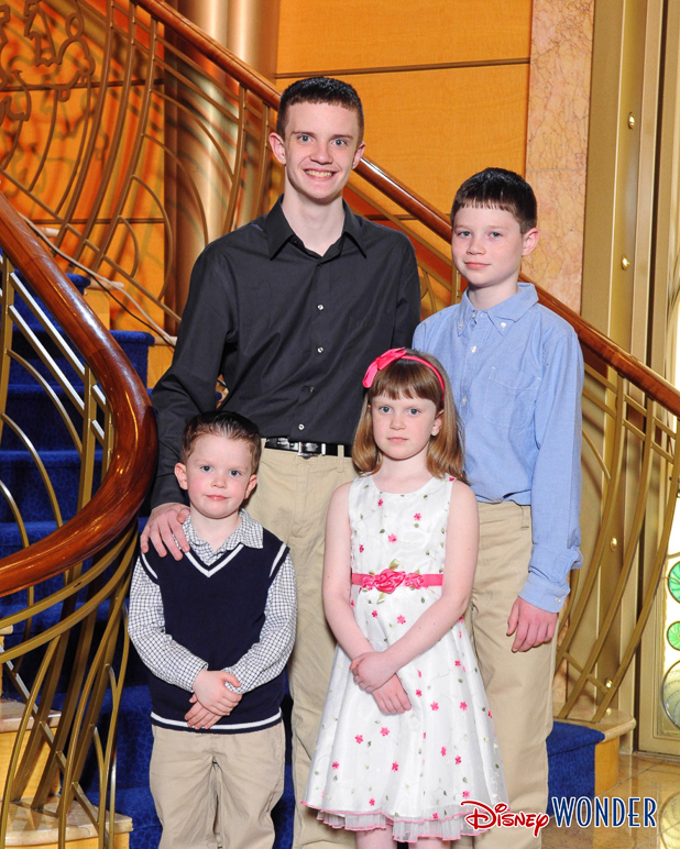 A formal picture of the kids on the main staircase aboard the Wonder. (328.58 KB)