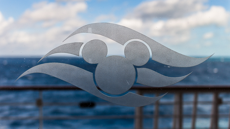 This Disney Cruise Line logo was on one of the glass doors leading out to the promenade. (144.89 KB)