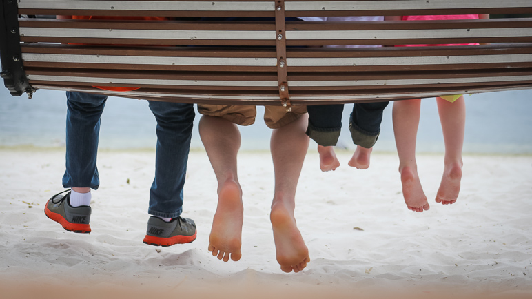 I'm really happy with this one of the kids' feet dangling above the sand (148.74 KB)