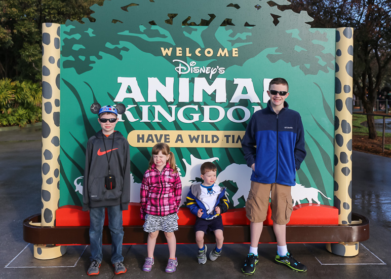 All four kids in front of the sign outside Disney's Animal Kingdom (292.47 KB)