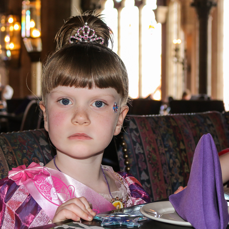 Katelyn shortly before our lunch inside Cinderella's Castle started (334.63 KB)