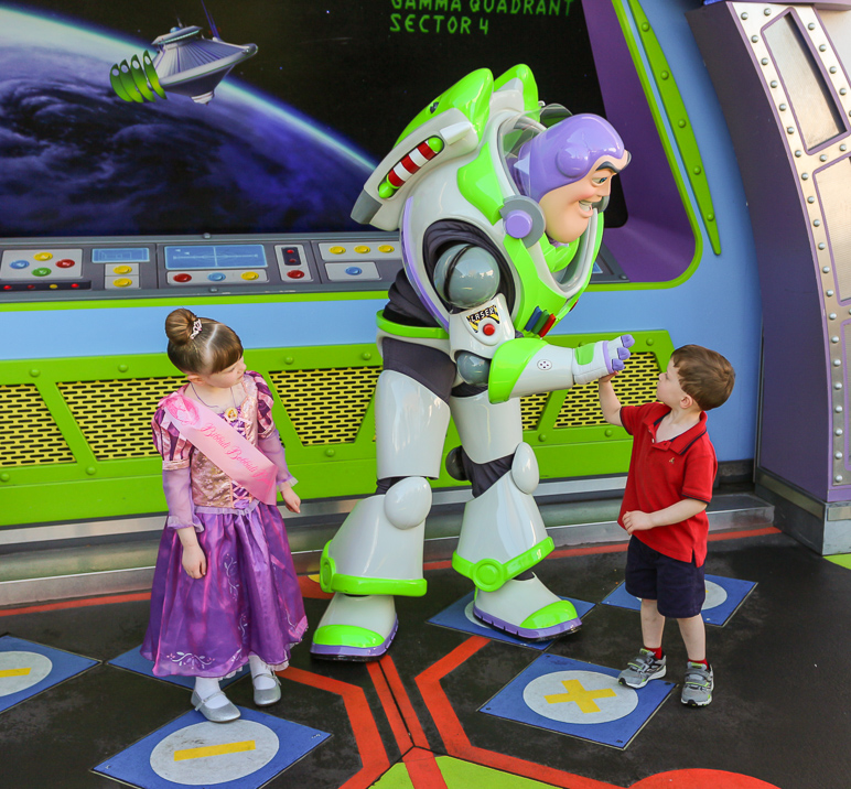 Luke and Buzz sharing a high-five. (368.44 KB)