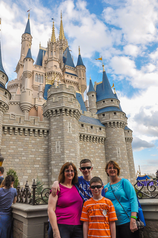My mom, my aunt Pam with Jake and Drew in front of Cinderella's Castle (303.35 KB)