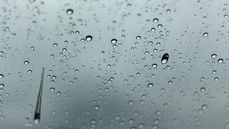 We couldn't see the eclipse at all for a time, so I took this of raindrops on the windshield. (160.94 KB)