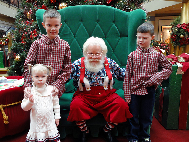 The kids with Santa.  Don't ask where Andrew's hand went. (283.89 KB)