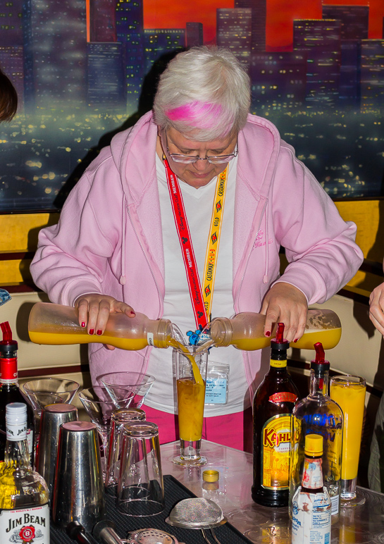 Carol mixing drinks. (307.47 KB)