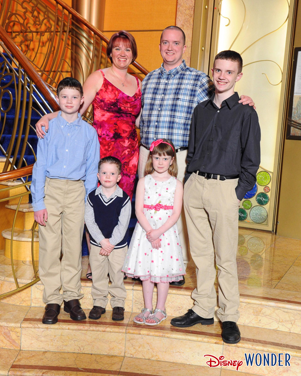 A formal family portrait aboard the Wonder. (352.02 KB)