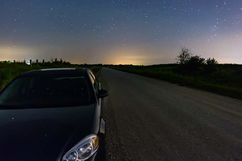 My car parked along side this dusty road (134.91 KB)