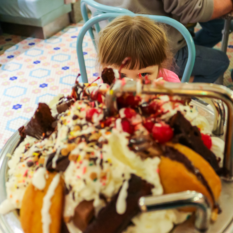 Katelyn, playing peek-a-boo behind "The Kitchen Sink" from Beaches & Cream Soda Shop (290.82 KB)