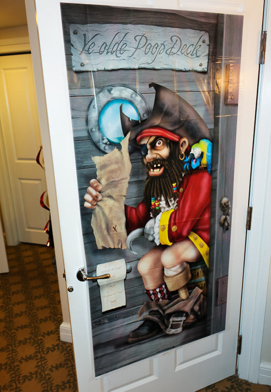 "Ye olde poop deck" on the boys' bathroom door. (222.87 KB)